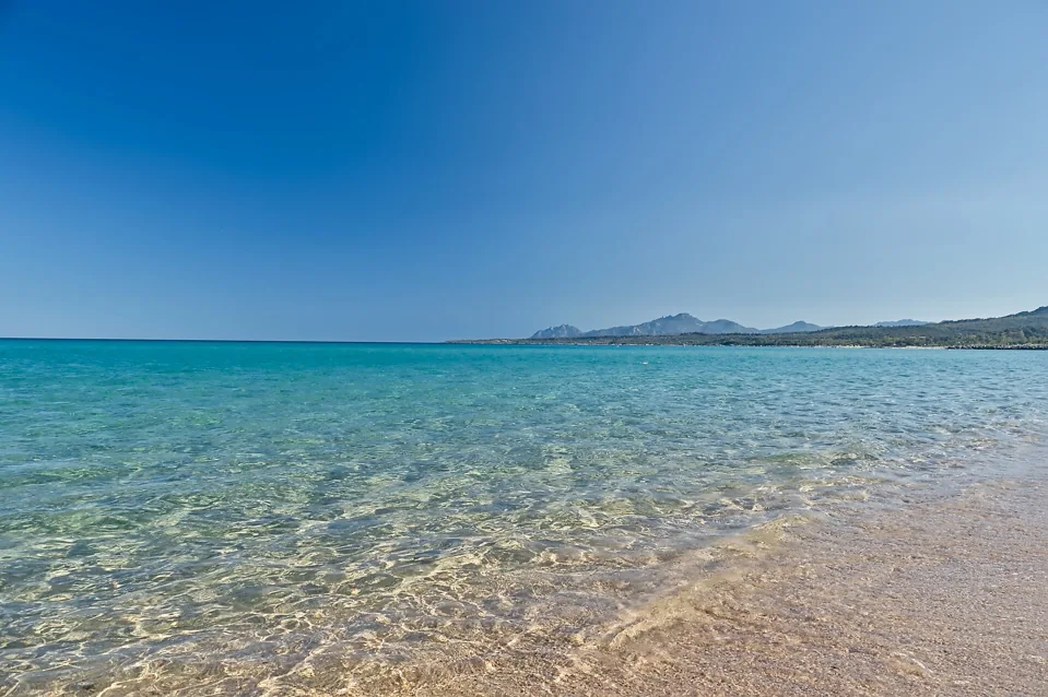Clear water at San Gemiliano beach in Sardinia, Italy